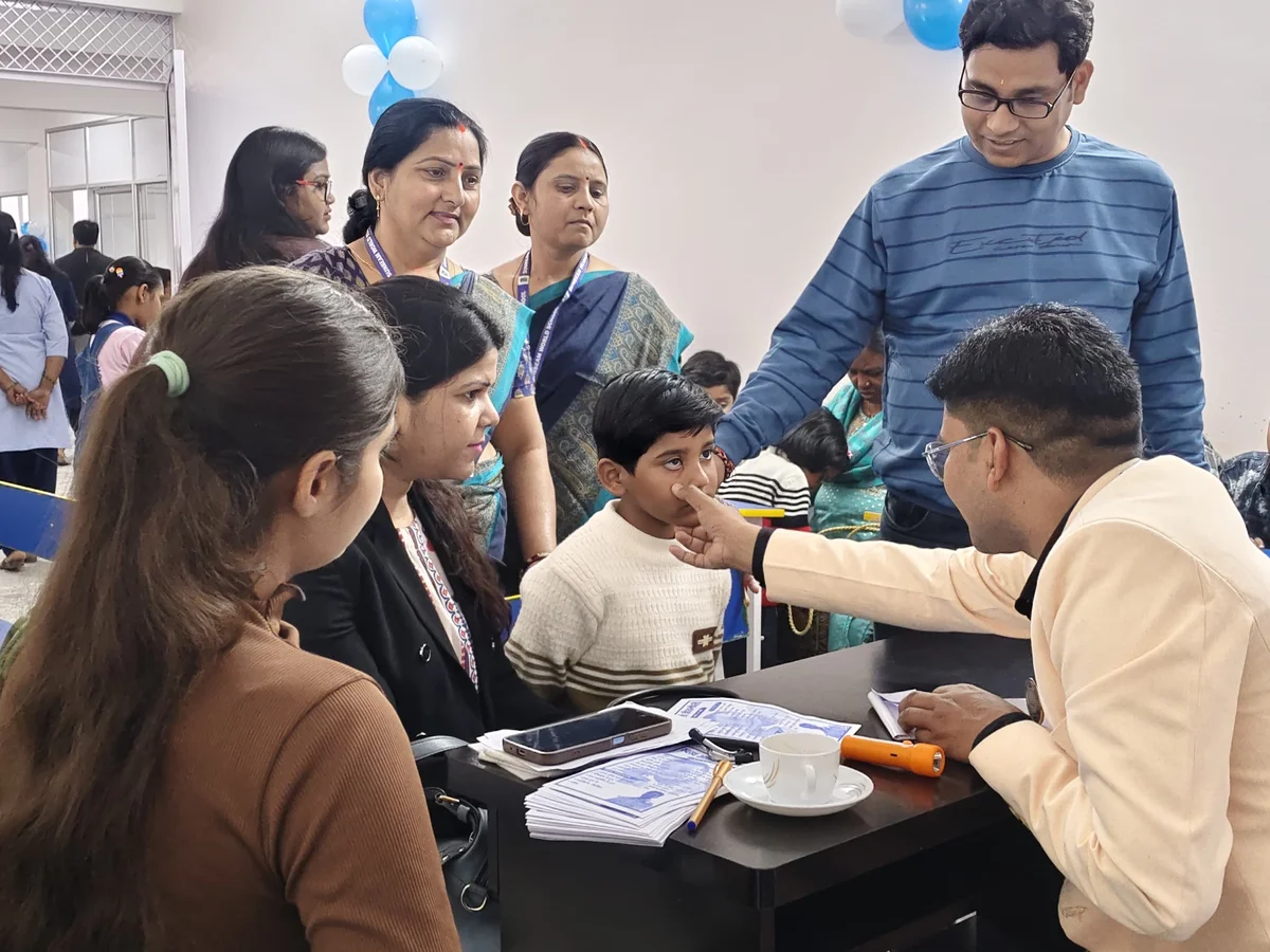 Staff conducting a student health check-up at Sunbeam World School, Varanasi