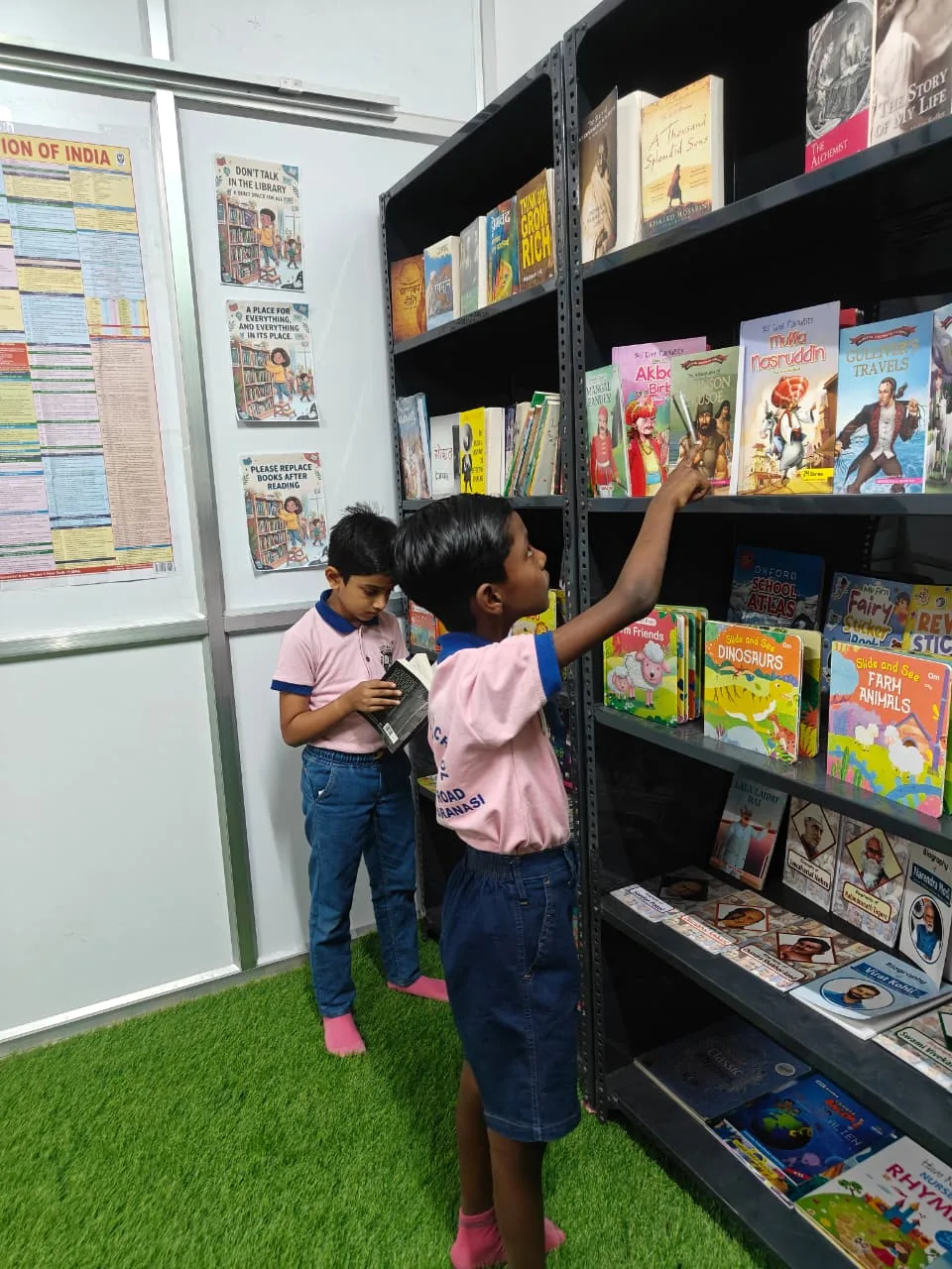 Students picking books in the library at Sunbeam World School, Varanasi