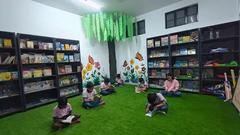 Children reading in the reading corner at Sunbeam World School, Varanasi