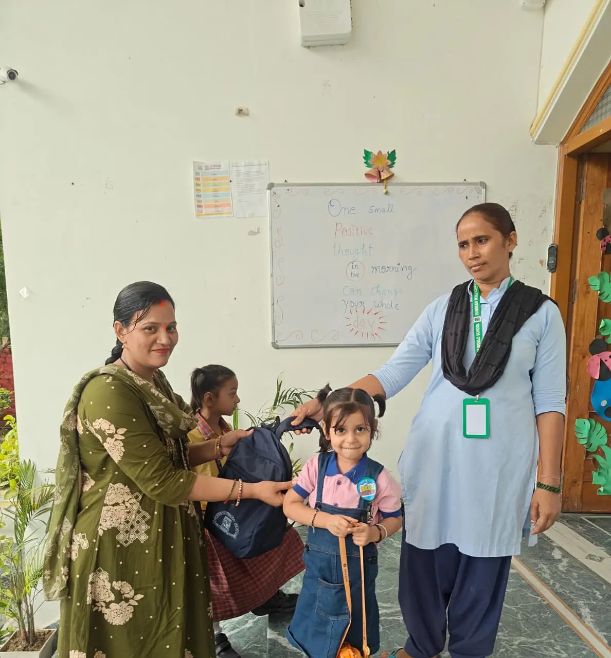 Staff supporting parents and students at a school Varanasi
