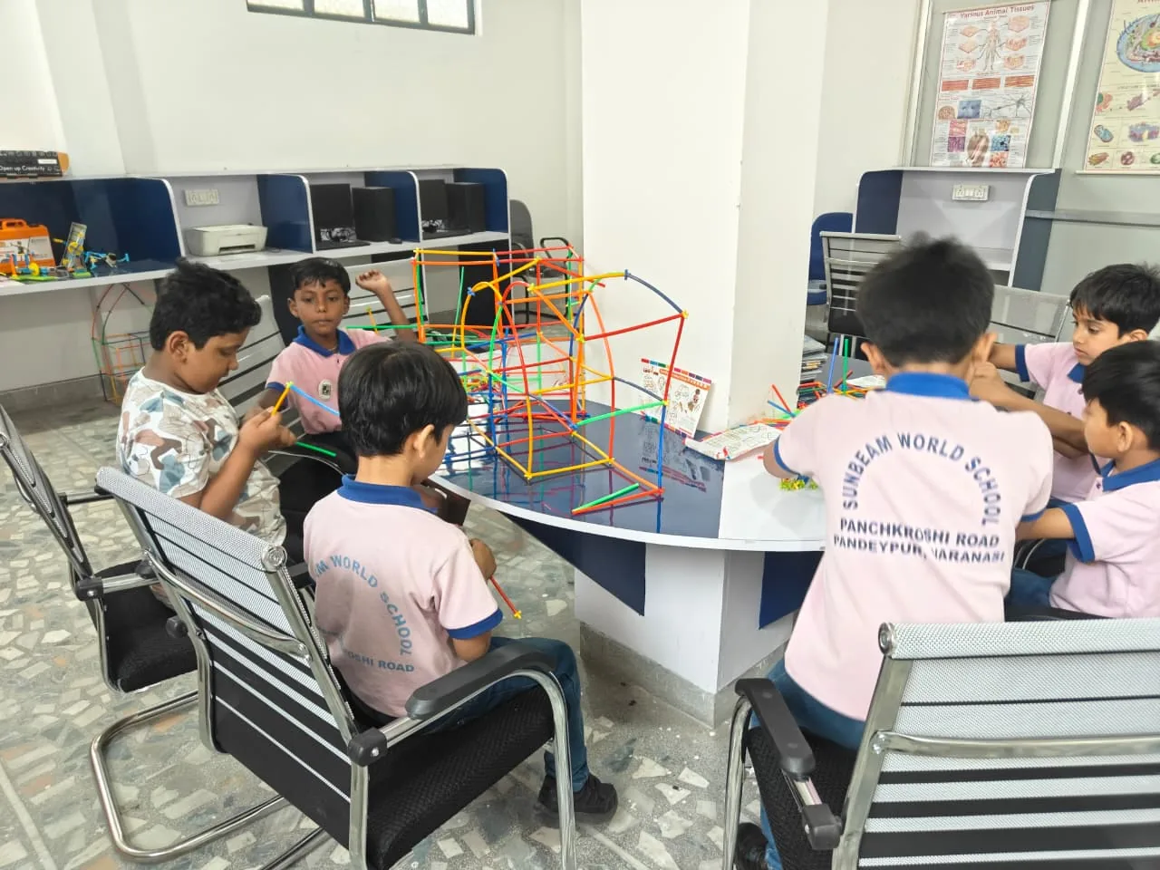 Students building models in the STEM and robotics lab at Sunbeam World School, Varanasi