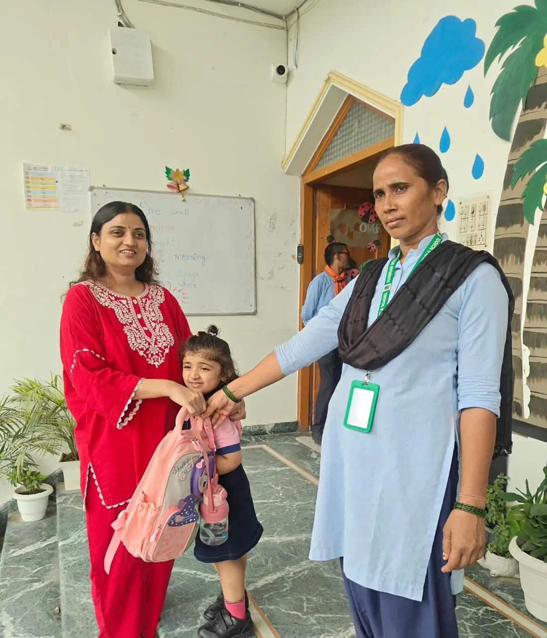 Staff supporting parents and students at a school Varanasi