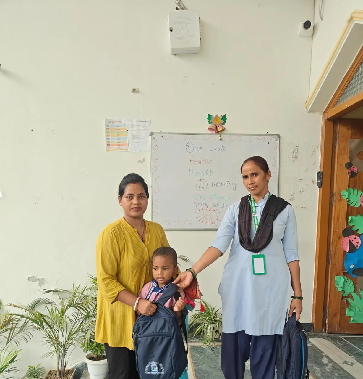 Staff supporting parents and students at a school Varanasi